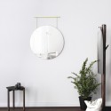 umbra exhibit miroir rond suspendu sur barre metal dore style chic