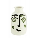 madam stoltz vase blanc visage souriant