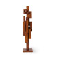 sculpture brutaliste bois fonce hk living skyline