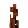 sculpture brutaliste bois fonce hk living skyline