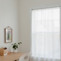 umbra chroma tringle a rideaux entre murs sans percage metal noir